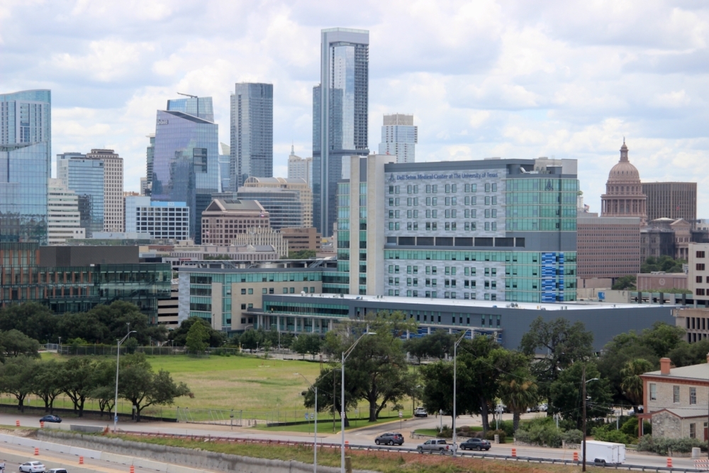 BThompson_CI's tweet card. Planned medical towers won't have to build around state development restrictions meant to protect views of the Capitol dome.