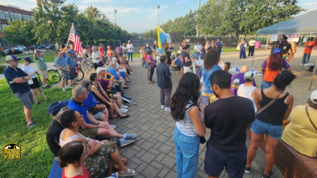 HudsonCoView's tweet card. Honoring John Lewis, a protest was held in Jersey City's Berry Lane Park against President Donald Trump (R) as part of a national effort.