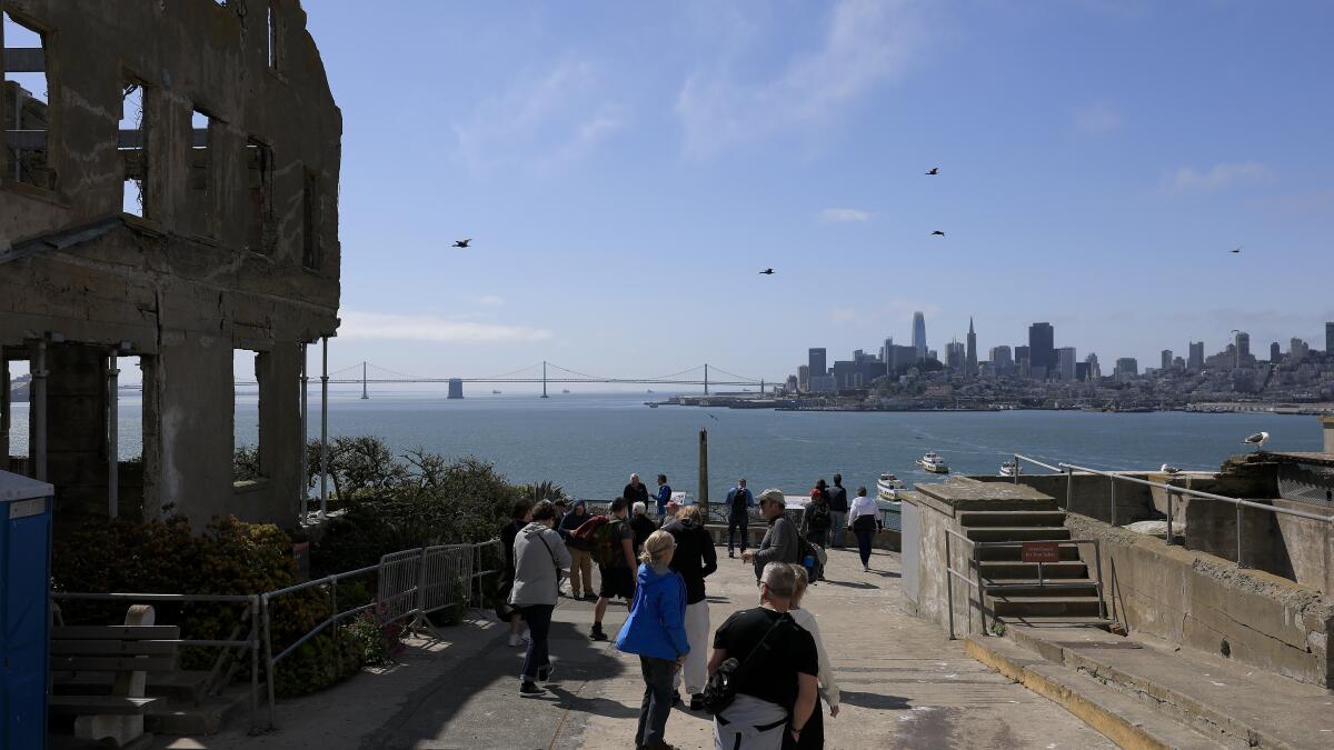 haileybranson's tweet card. Two federal officials traveled to California to visit the shuttered Alcatraz prison, part of a plan to soon announce the reopening of the infamous federal prison.