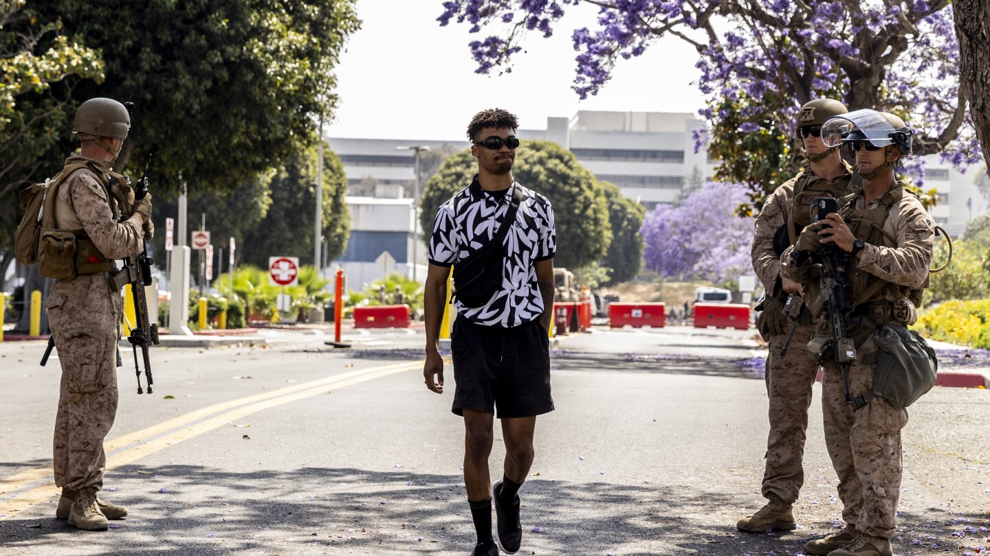JimmyJenkins's tweet card. U.S. Marines have temporarily detained a man after he walked onto the property of a federal building they were guarding in Los Angeles.