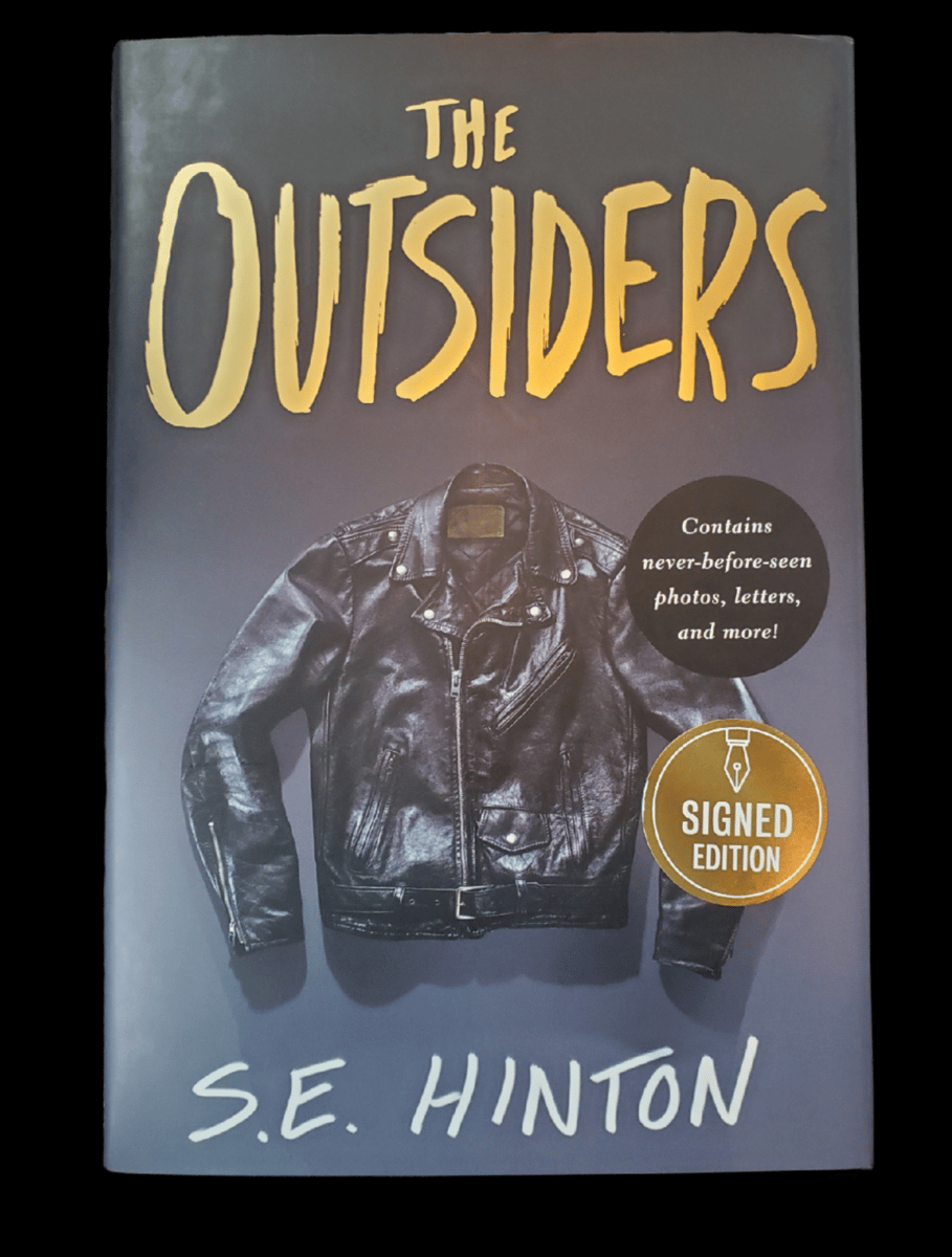 OutsidersHouse's tweet card. The Outsiders. Hardcover Autographed by S. E. Hinton. 50th Anniversary novel.
