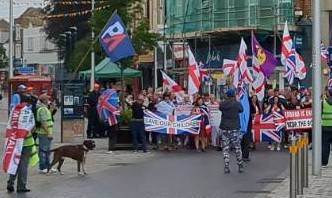 Searchlight_mag's tweet card. PA and UKIP flags on display as GBNP demonstrators start the day at the Golden Lion pub in Dover Although the promised south coast thunderstorms didn't ...