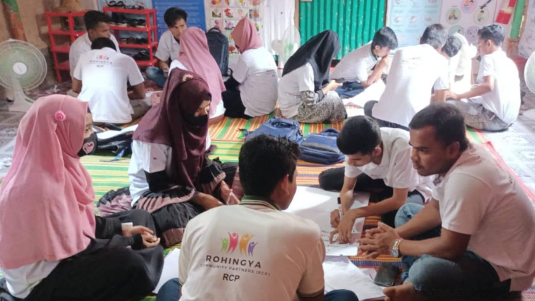 RohingyaRCP's tweet card. We are Rohingya Community Partners (RCP), a refugee-led organization committed to empowering our community from within. Today, we are excited to share a powerful new initiative: the Capacity Building...