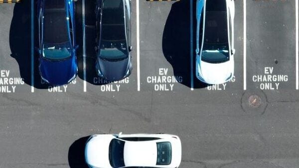 XMCInc's tweet card. Guidance for electric-vehicle industry aims to protect charging payment systems and links to wider grid