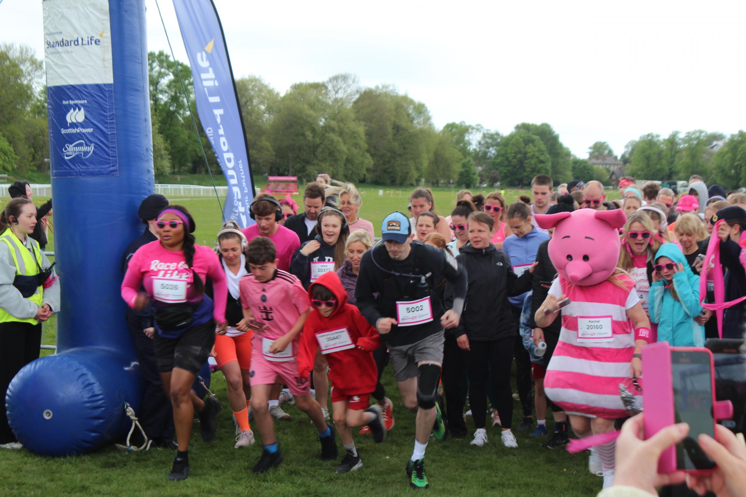 lisa_millett's tweet card. The York Race for Life 2025, hosted on the Knavesmire, has raised more than £130,000 for Cancer Research UK.