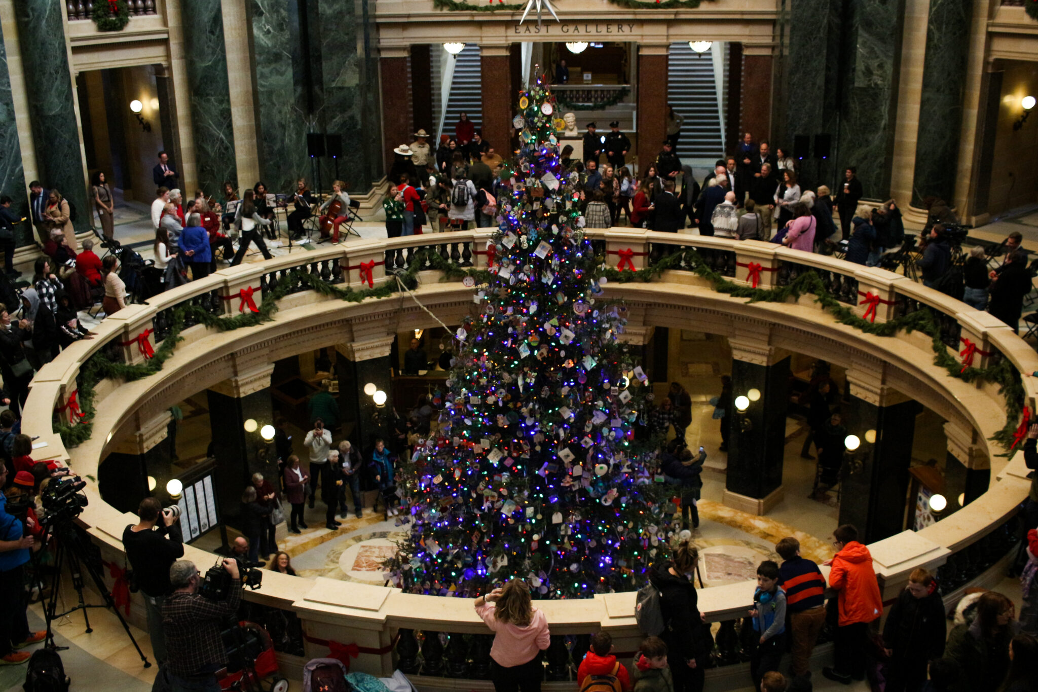WIExaminer's tweet card. After lighting Wisconsin's capitol tree, Gov. Tony Evers said he's chosen a new DNR secretary and is focused on passing a new state budget.