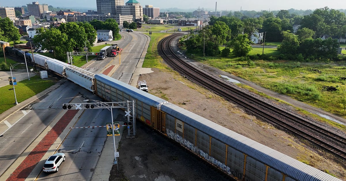 mandygambrell's tweet card. Two rail cars on a train passing through the city of Hamilton on Thursday night derailed, blocking several railroad crossings.