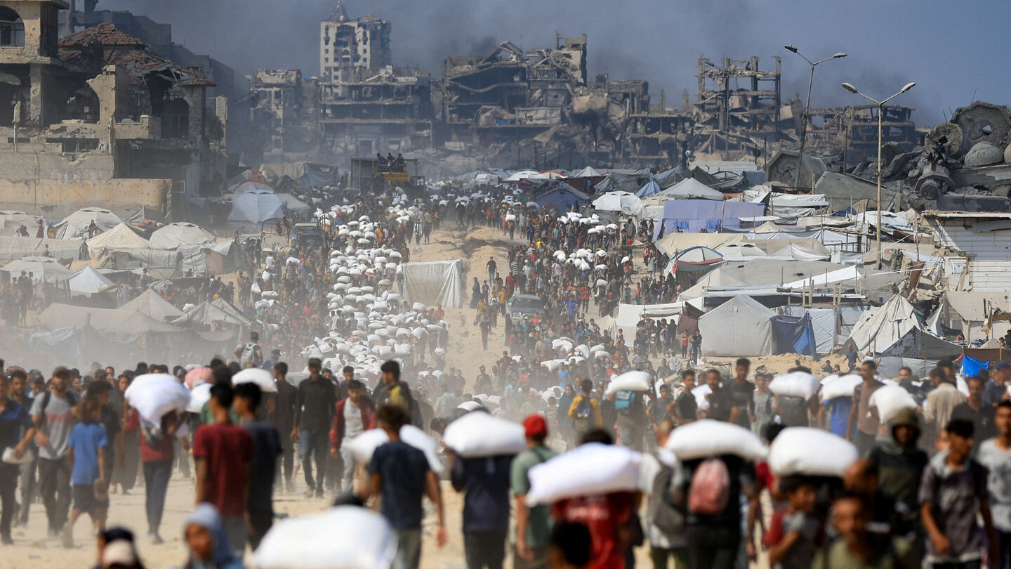 OpenBorders4Aid's tweet card. The occupation army ordered the civilians to approach aid trucks with their hands raised—a clear sign of surrender—and then opened fire on them without provocation.