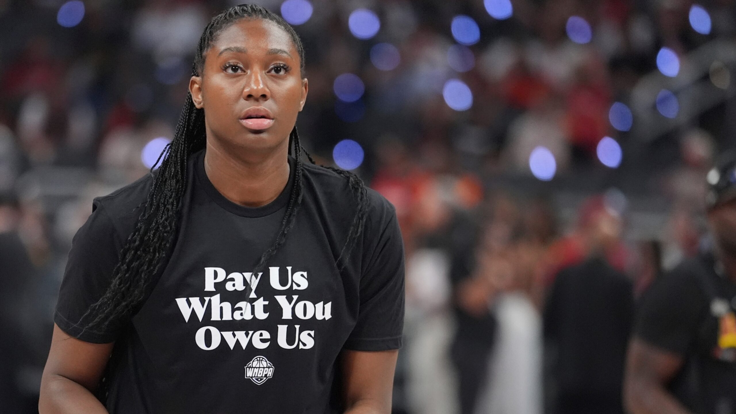 D_Stieber's tweet card. WNBA players are demanding fair pay and better revenue sharing as CBA talks break down. At the All-Star Game, they wore shirts saying so.
