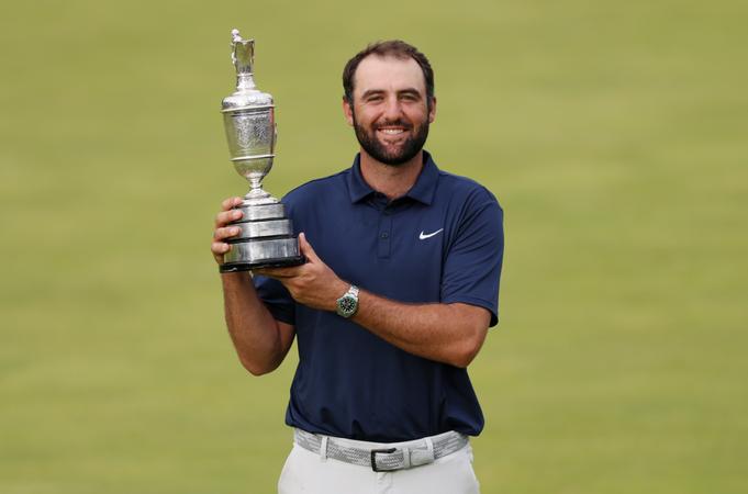 TexasMGolf's tweet card. Former Longhorn claims his fourth career major title and first Open Championship with four-stroke victory.