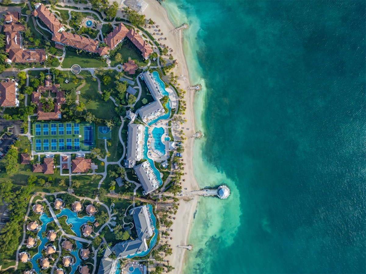 caribjournal's tweet card. There’s a different rhythm here. A deeper green in the hills. A richer blue in the sea. A feeling that’s unmistakably, beautifully Jamaica.