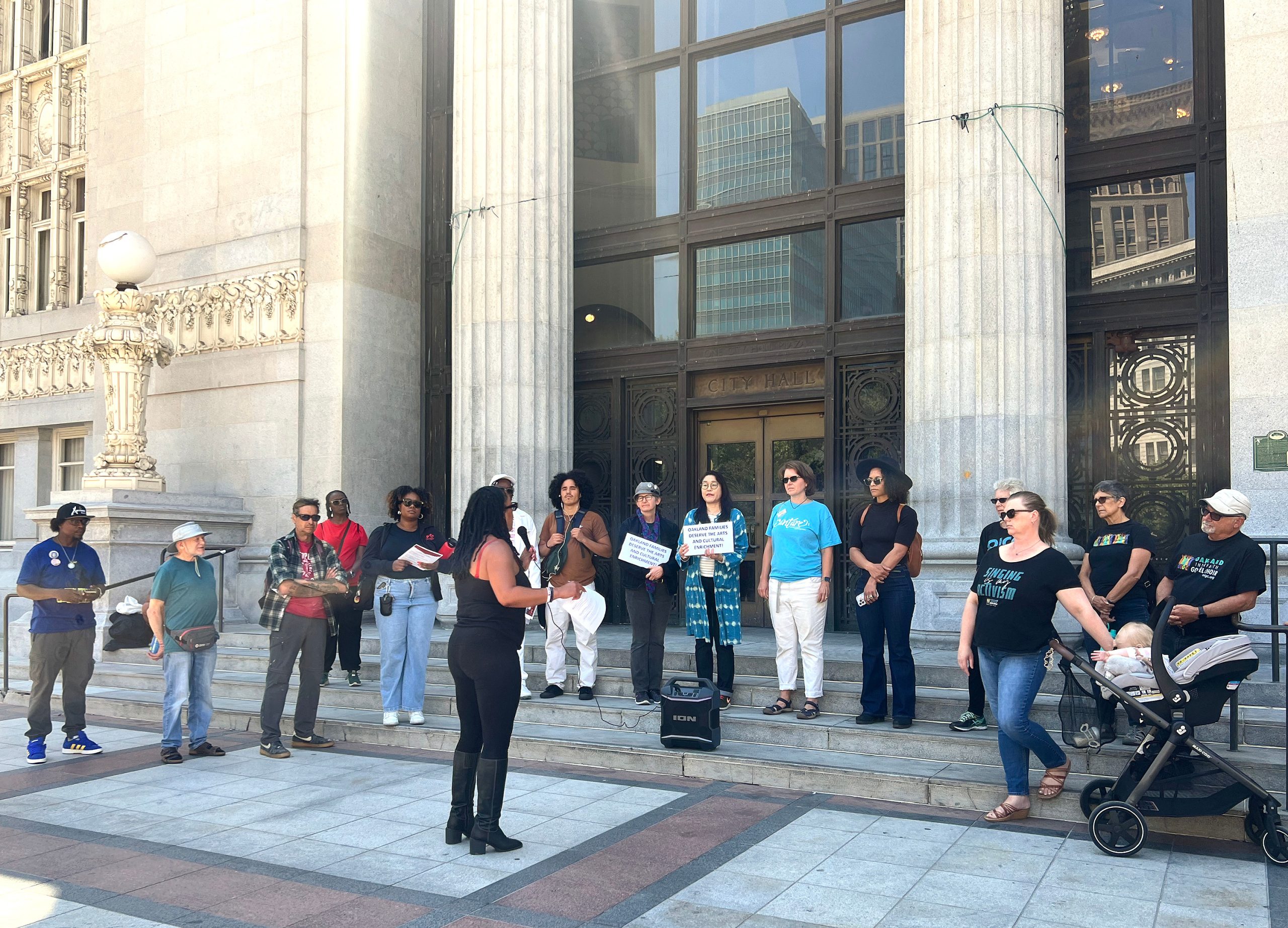 APTPaction's tweet card. OAKLAND ARTISTS AND ACTIVISTS joined the Anti Police-Terror Project at City Hall to demand the reinstatement of the city’s arts and culture manager