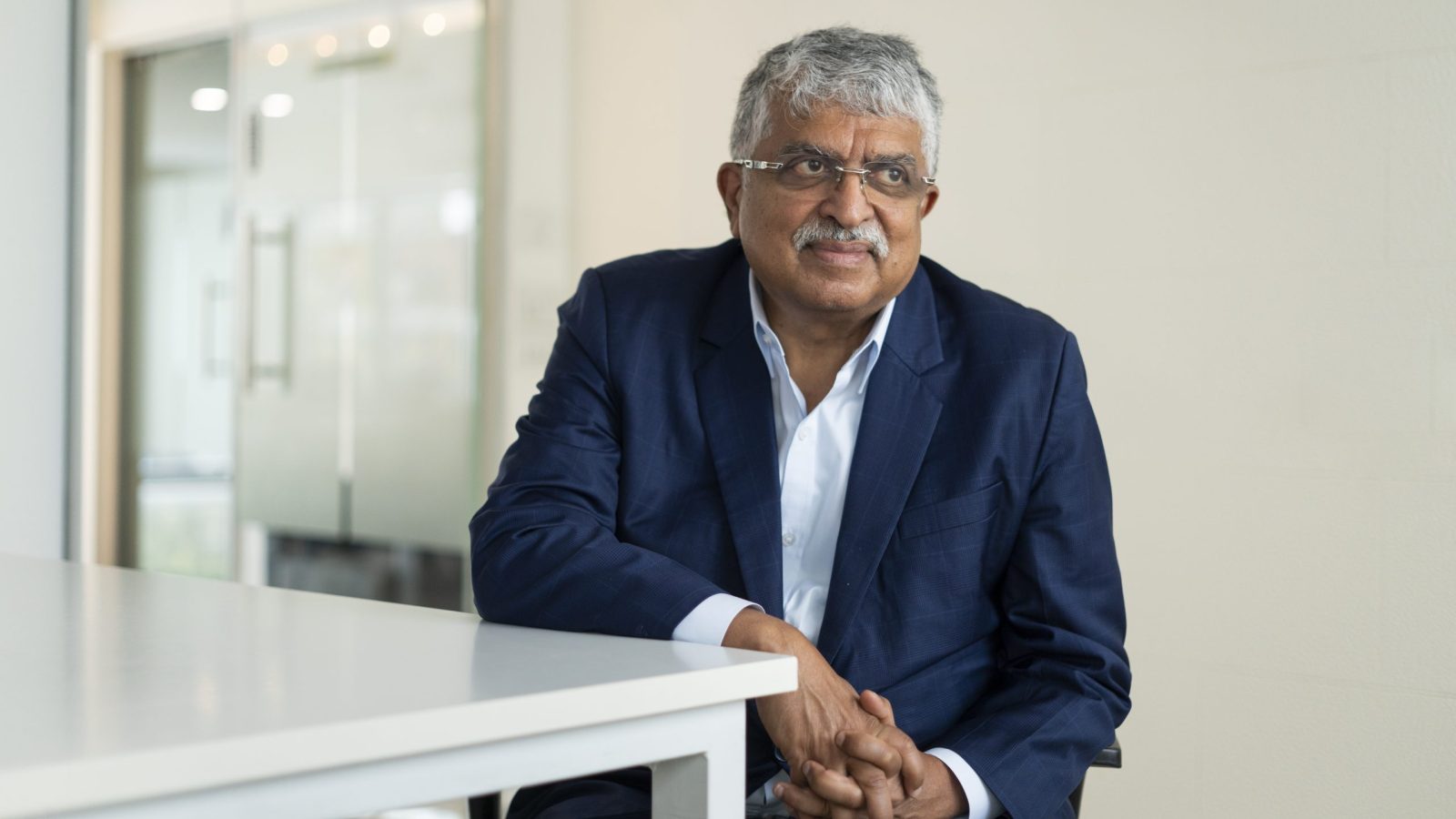 JeelaniReports's tweet card. Nandan Nilekani, the mind behind India’s digital revolution, says the future of AI will not be shaped by who builds the bigger model but by small systems designed to resolve real-world problems.
