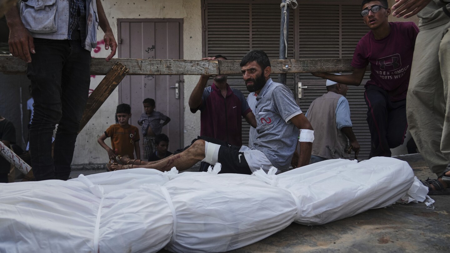AP's tweet card. The U.N. food agency says Israeli forces fired on Palestinians seeking food aid in northern Gaza on Sunday.