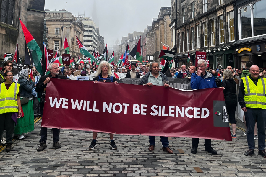 brawday's tweet card. A 70-year-old woman has been arrested under terror legislation after a pro-Palestine demonstration in Edinburgh