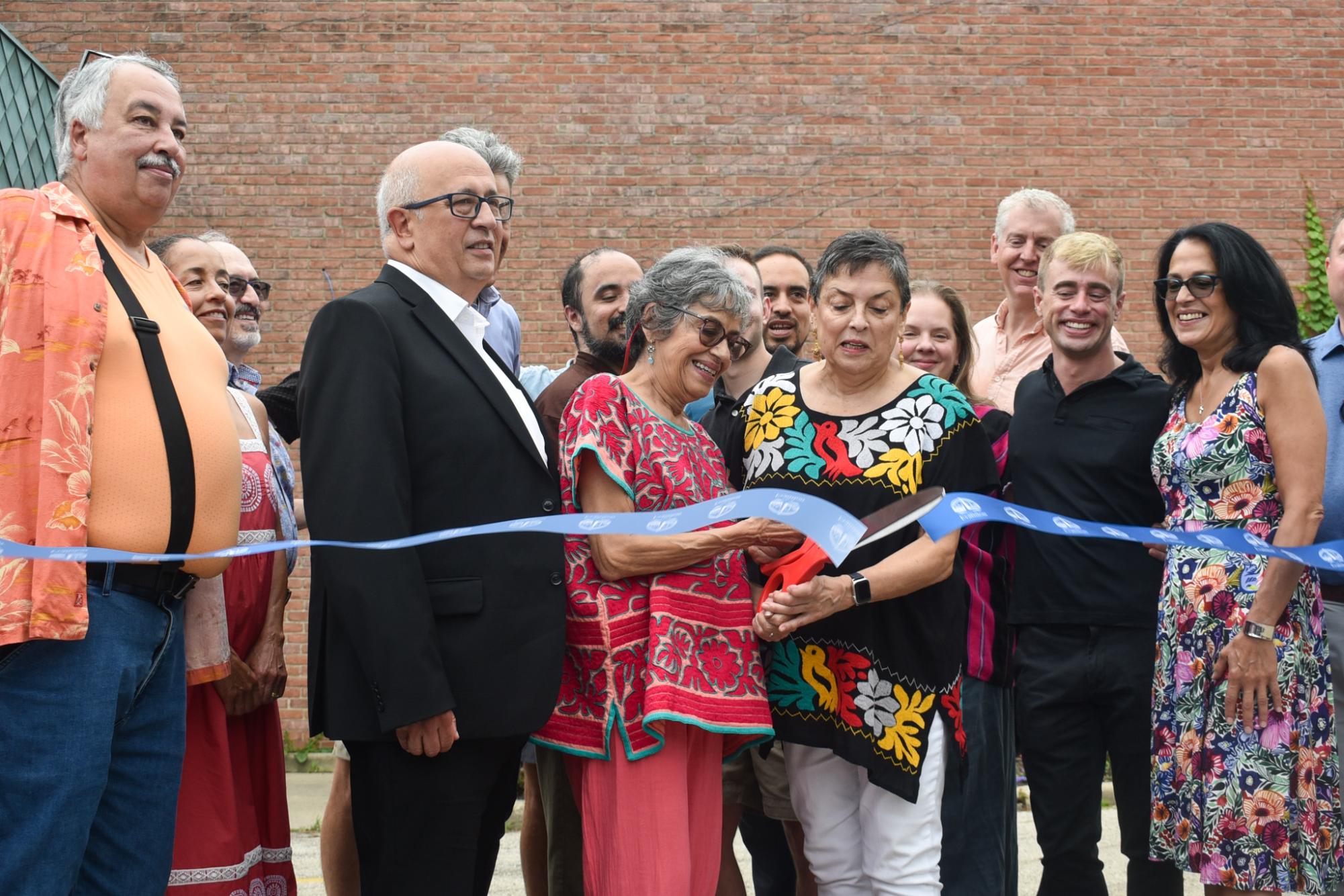 thedailynu's tweet card. As attendees strolled up to the ribbon cutting of the Dr. Jorge and Luz Maria Prieto Community Center on Saturday, more people greeted each other with hugs than handshakes, exchanging “it’s-nice-to...