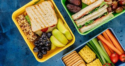 InsideNoVA's tweet card. Standing behind tall shelves and ovens in the back of the cafeteria at Bristow Run Elementary School, Rafaela Herrera is taking cooked hamburger patties off a long baking sheet and placing them onto...