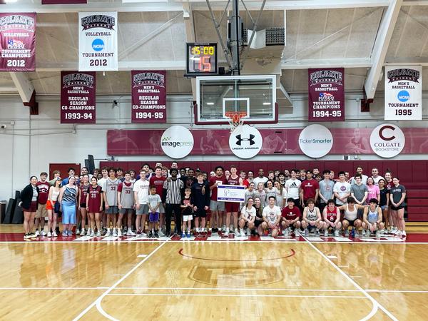 ColgateSNews's tweet card. Men’s Basketball Honors Late Professor