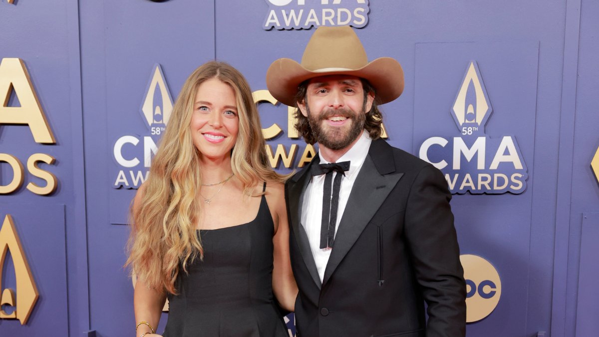 iHeartCountry's tweet card. Thomas Rhett had his wife and kids by his side as he marked a major milestone moment, "and my mind is blown.”