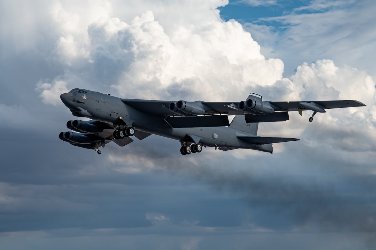 defense_news's tweet card. “Sorry about the aggressive maneuver,” an airline pilot told passengers after sharply banking to avoid a B-52 over North Dakota. "Not a fun day at work."
