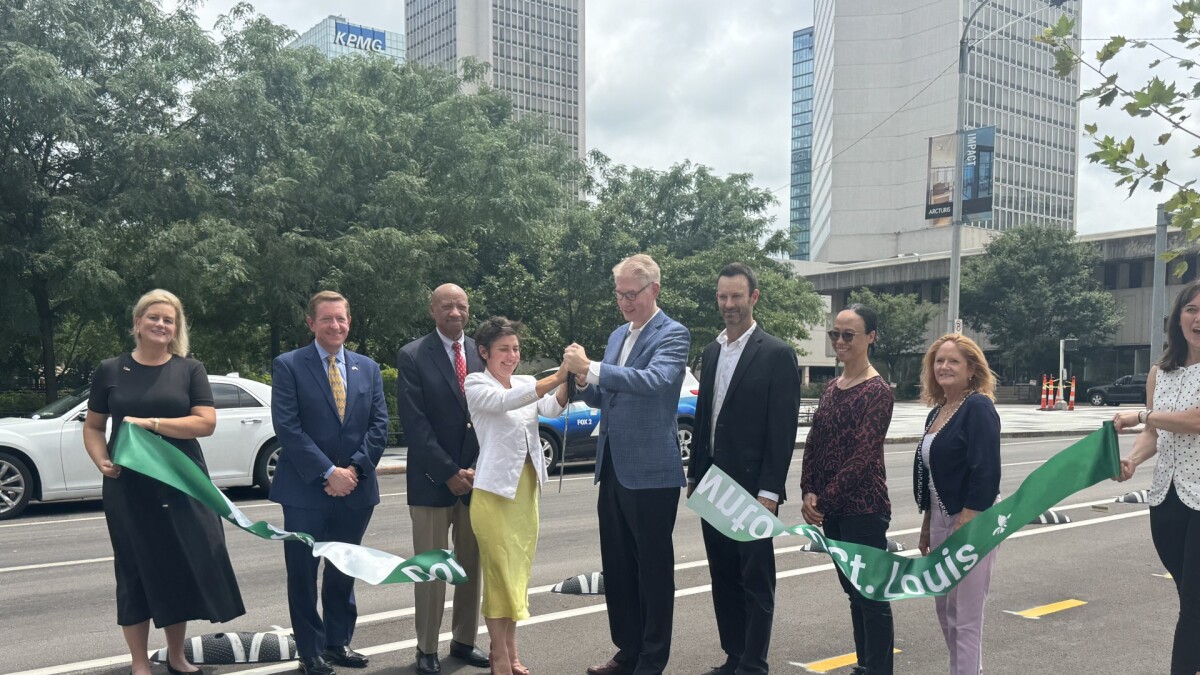 stlpublicradio's tweet card. The stretch of road from Walnut Street to Washington Avenue received a facelift, including new bike lanes and repaving.