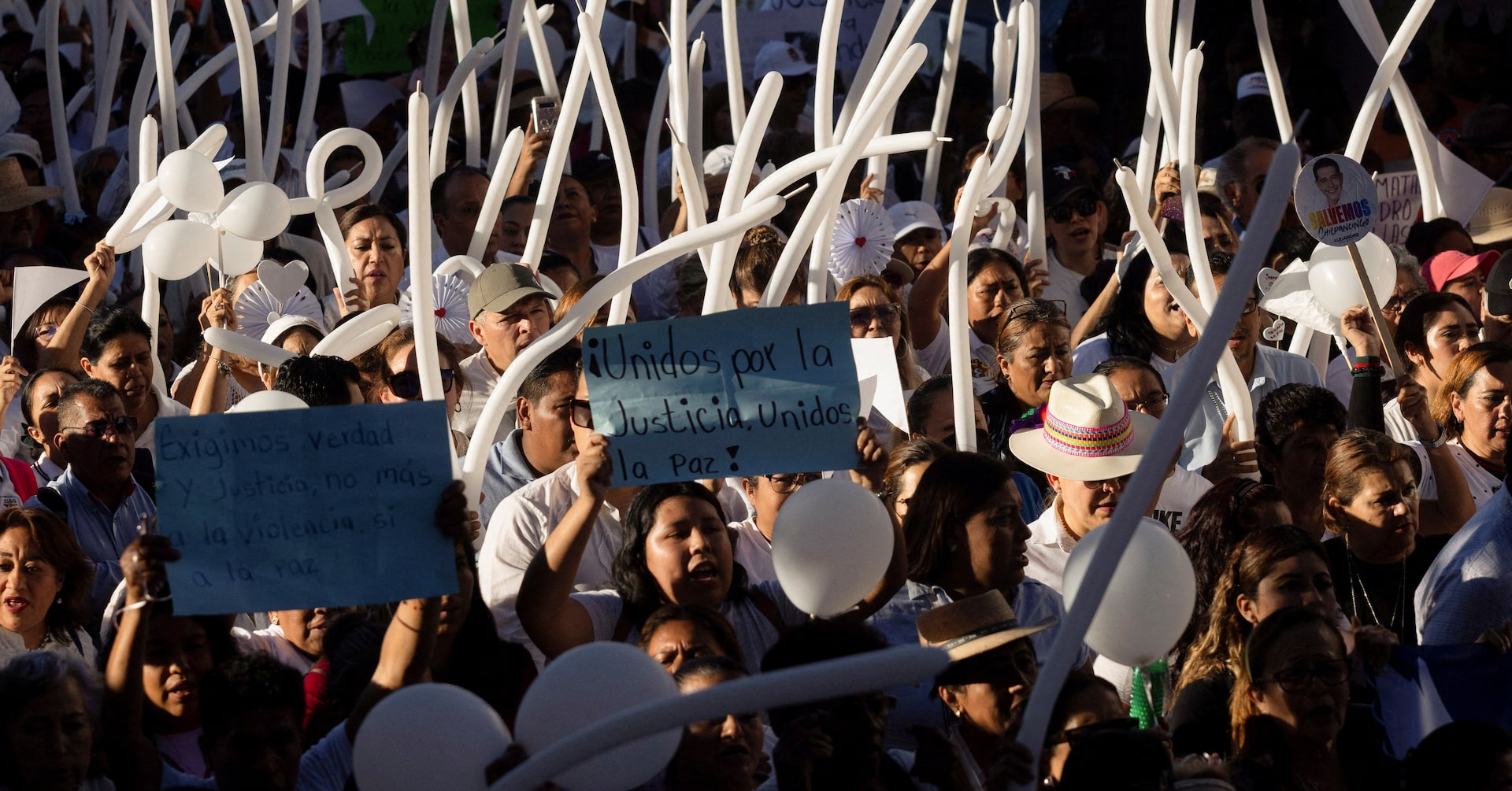 CassLGarrison's tweet card. Hundreds of people dressed in white marched through the streets, many with tears in their eyes, chanting "No More Violence!" on a humid October afternoon in Chilpancingo days after the brutal murder...