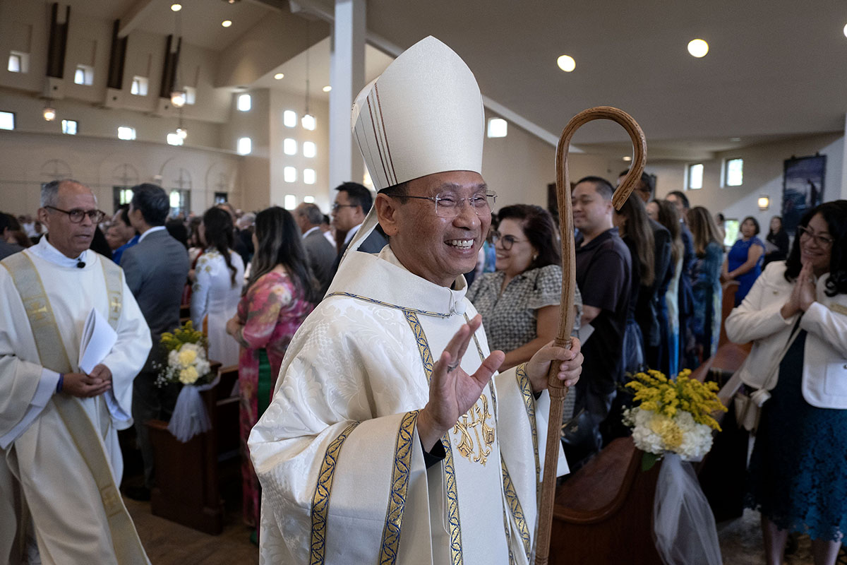 OSVNews's tweet card. St. Thérèse of Carmel Church was filled to capacity by an estimated 1,200 faithful, as Bishop Pham was solemnly installed as the seventh bishop of San Diego July 17, becoming the first Vietnamese-A...