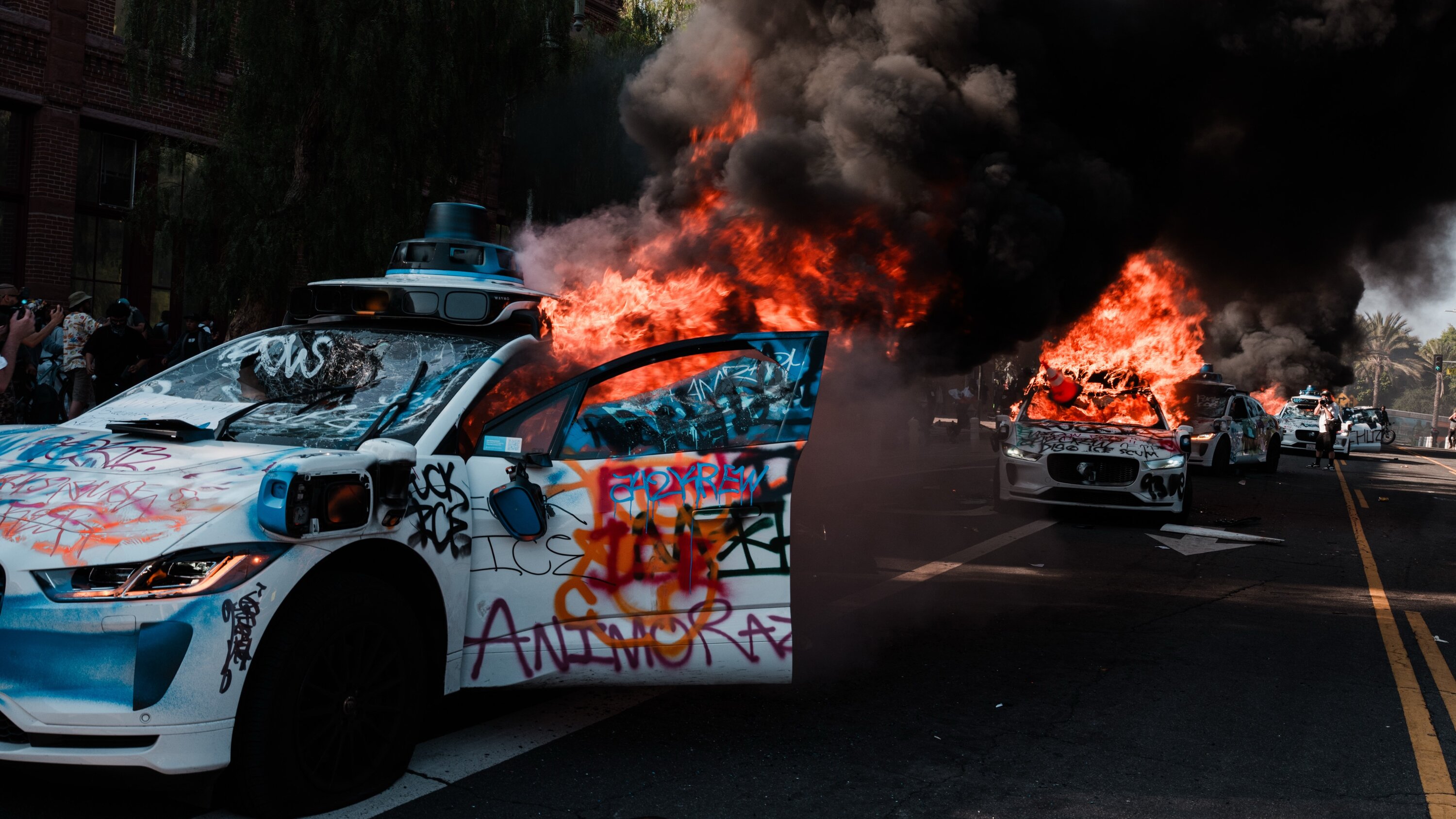 theShamir's tweet card. The self-driving taxi company also said its vehicles were in the wrong place at the wrong time in Los Angeles after protesters set fire to several of the cars there.