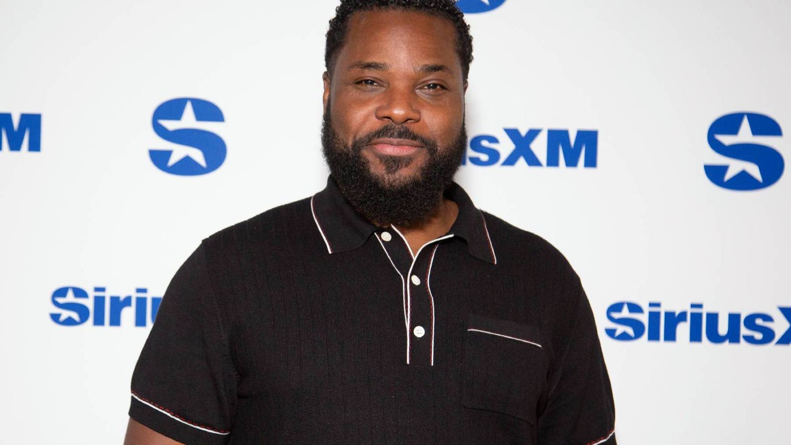 RollingStone's tweet card. Stars like Beyoncé, Tracee Ellis Ross, and Jamie Foxx pay tribute to Malcolm-Jamal Warner after his sudden death at 54 in Costa Rica.