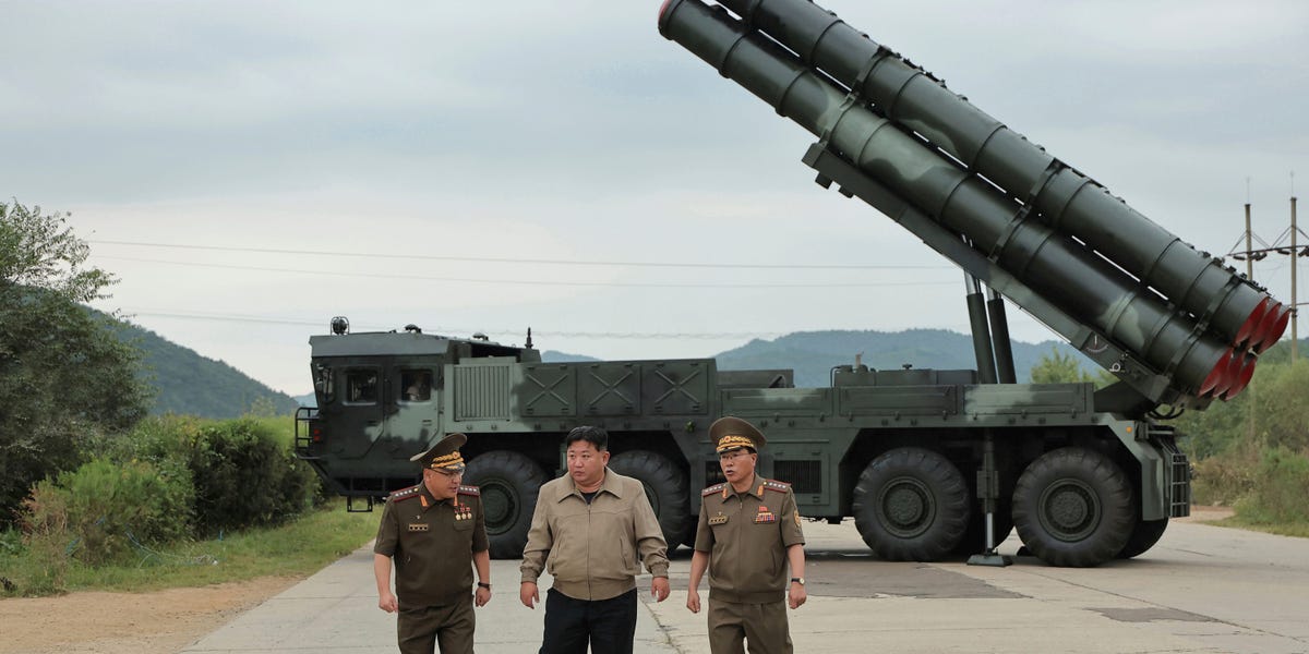 BusinessInsider's tweet card. Ukrainian units have been uploading clips of their FPV drone attacks on Pyongyang's rocket launchers, which are designed with their missiles exposed.