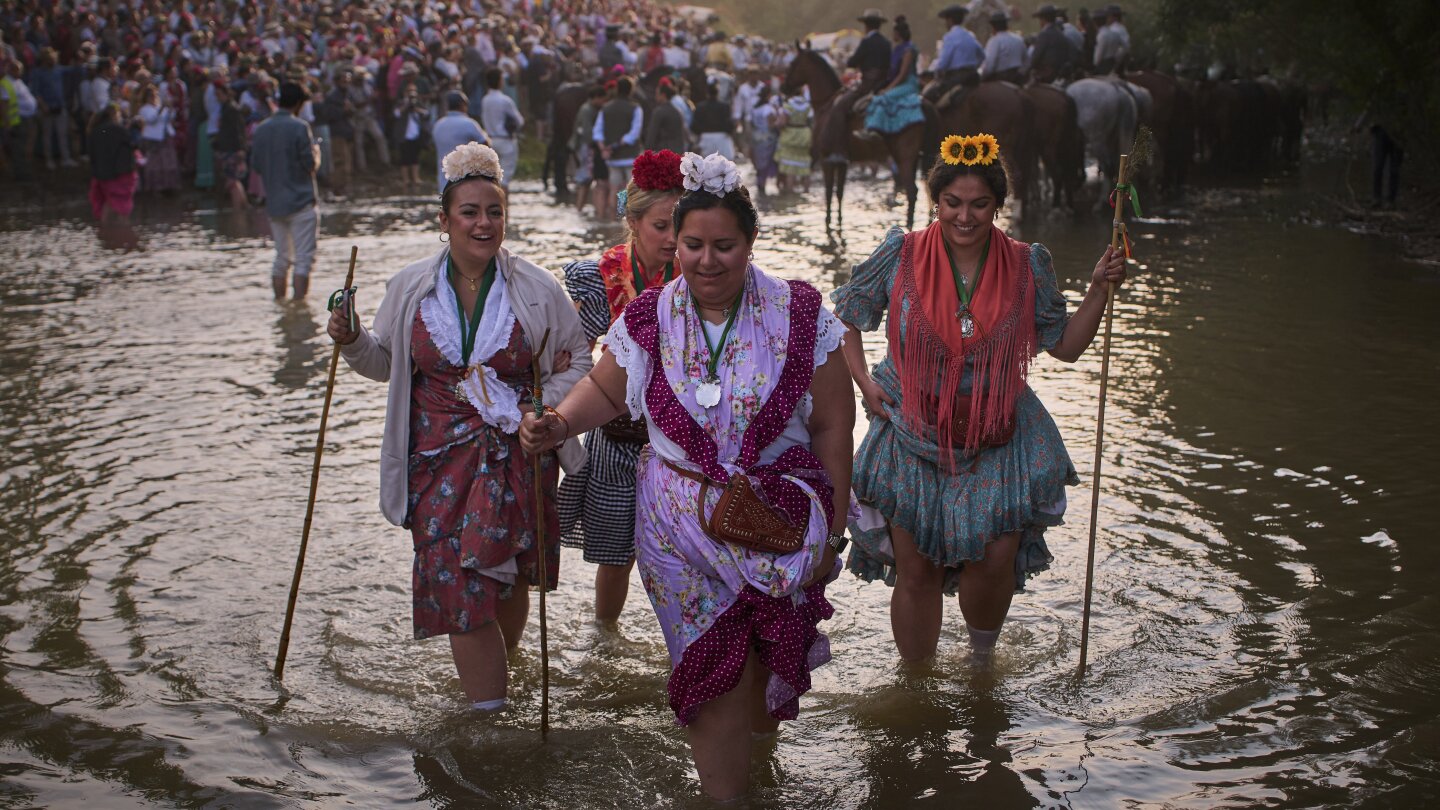 EmilioMorenatti's tweet card. EL ROCIO, Spain (AP) — Hundreds of thousands of Catholic pilgrims slogged for days under a punishing sun through country roads, sandy paths, even a river ford to reach the tiny hamlet of El Rocío in...