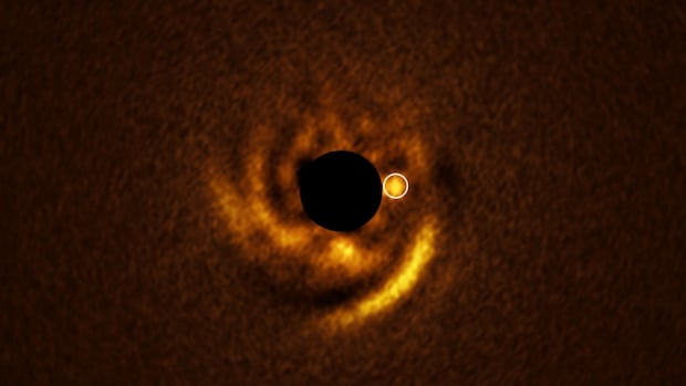 CBCNews's tweet card. Astronomers believe they have captured an image of a planet in the act of forming, something that has never before been witnessed.