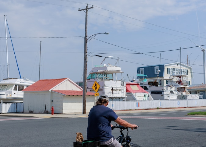 BaltimoreBanner's tweet card. If the water overtakes Crisfield, some may stay. But many more wonder: Is a community that experiences costly floods every day still a community?