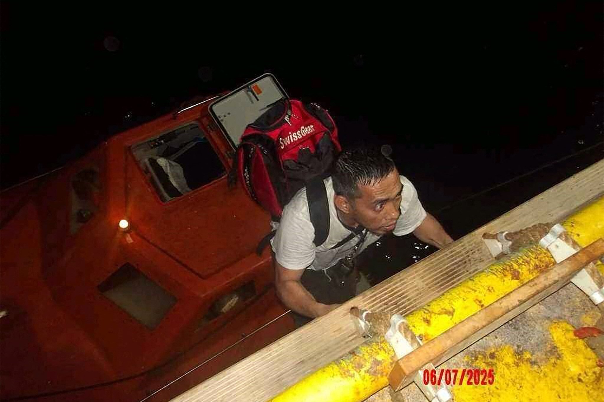 H_I_U_P's tweet card. Filipino mariner notes it was his first passage through Red Sea, describes panic among crew during July 6 attack, says images of family flashed before his eyes during gunfight