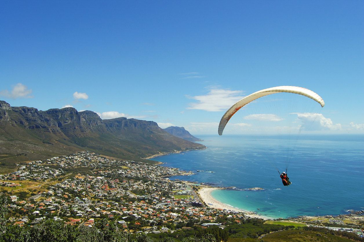 JayParbhoo's tweet card. We see your fjords, New Zealand - but have you tried a braai at sunset on the edge of the Kalahari?