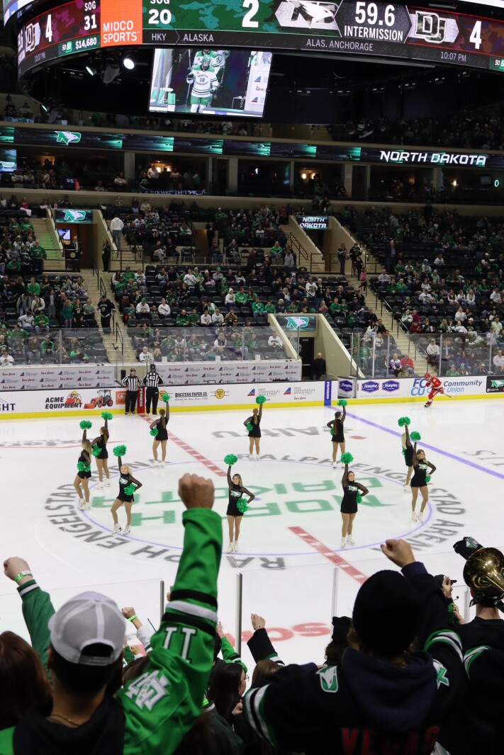 iserman_tv's tweet card. What started as cheerleaders turned skaters, has now evolved into figure skaters turned cheerleaders.