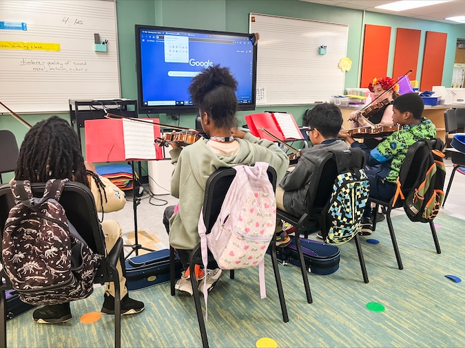 BaltimoreBanner's tweet card. Only five elementary schools offer band or orchestra classes. Starting next fall, the district will hire one instrumental music teacher to work between two schools in a pilot model.