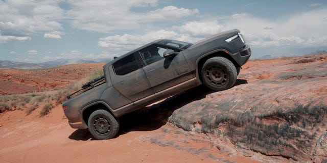 RJScaringe's tweet card. Rivian's latest quad-motor EVs are sporty on the road and dominate rough terrain.