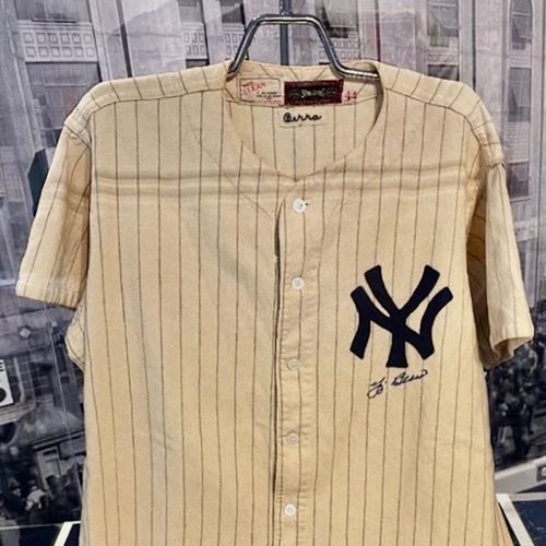 YogiBerraMuseum's tweet card. Jersey features No. 35, which Berra wore before donning his famed No. 8