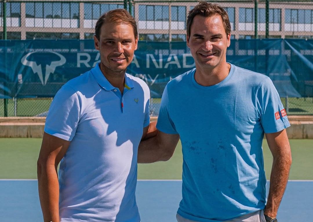 Tennis's tweet card. Federer also signed autographs and snapped selfies with students who were there taking tennis lessons.