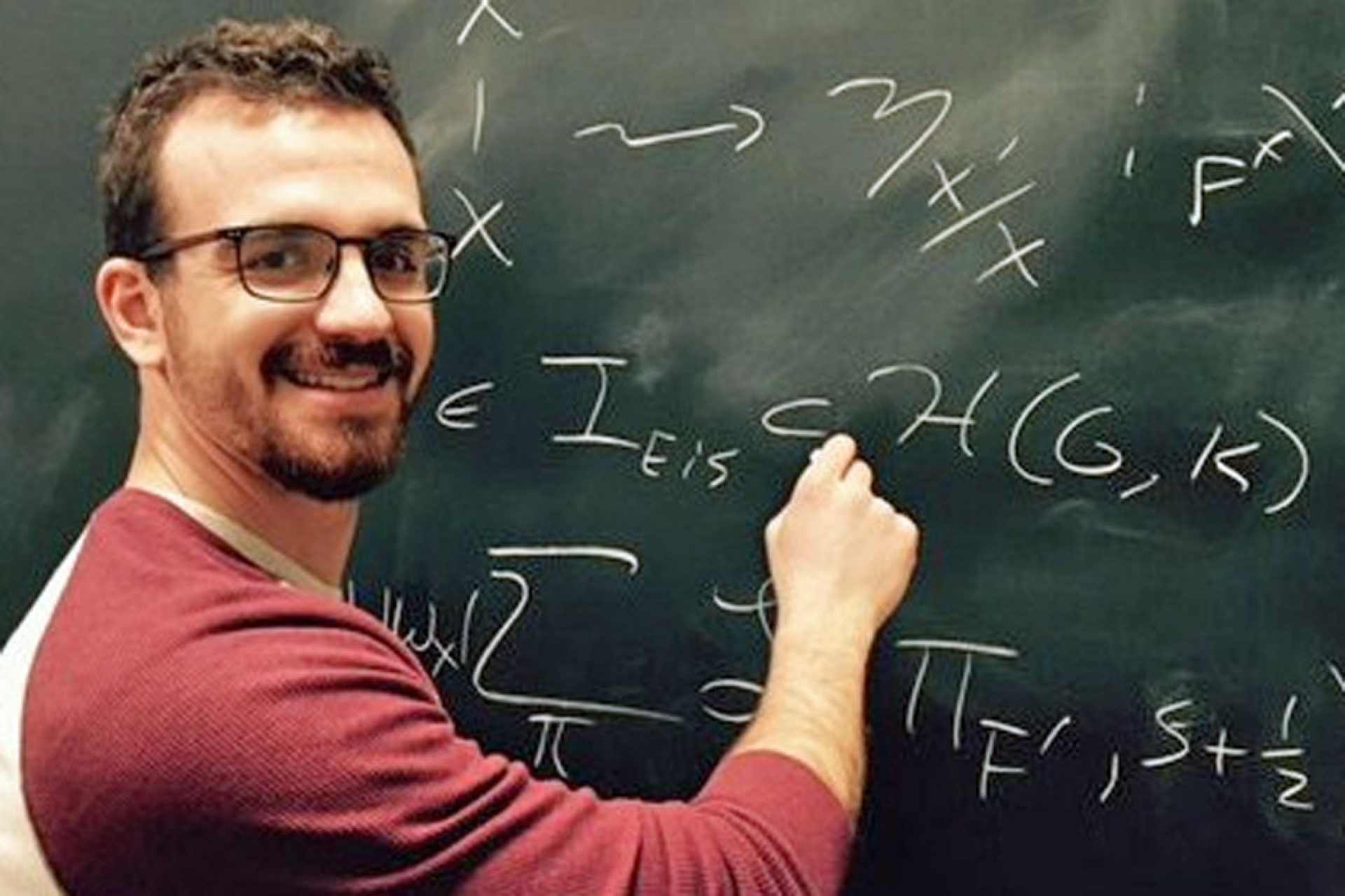 BostonCollege's tweet card. The five-year award will support his research on automorphic forms