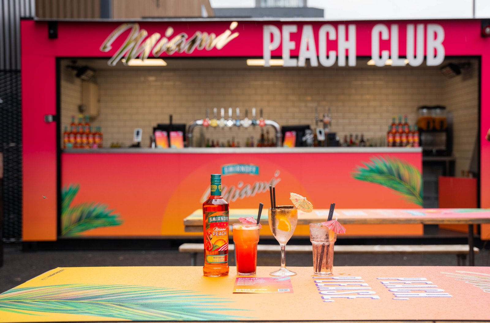 scousescene's tweet card. BOXPARK Liverpool's amazing outdoor garden has been taken over and transformed into Smirnoff’s Miami Peach Beach for the summer!
