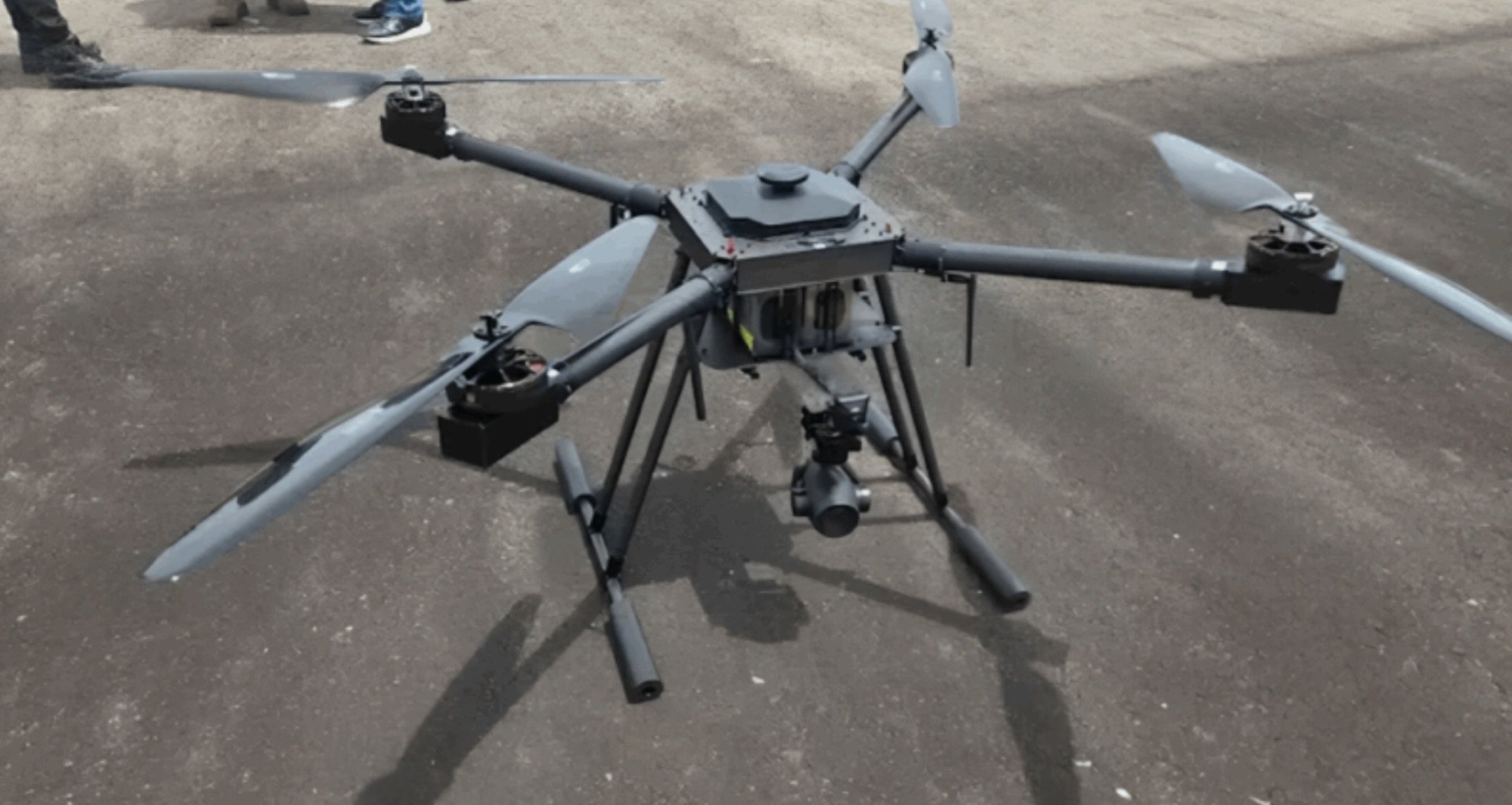 DroneXL1's tweet card. Colombia’s military tests a new domestically produced drone that packs significant firepower to counter escalating aerial attacks from drug traffickers, who
