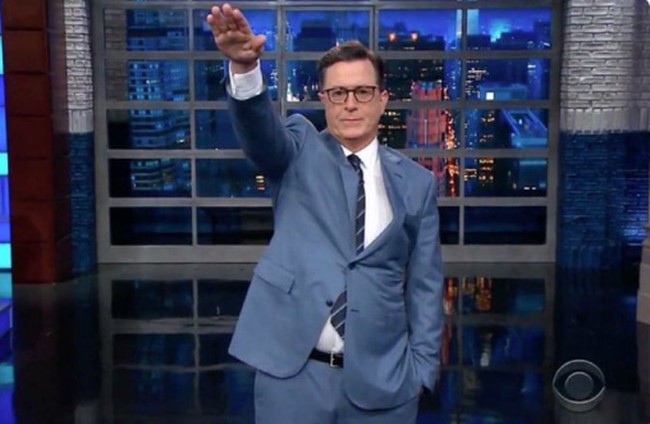 sandydubya's tweet card. Stephen Colbert's show cancellation sparks debate over ratings and political influence.