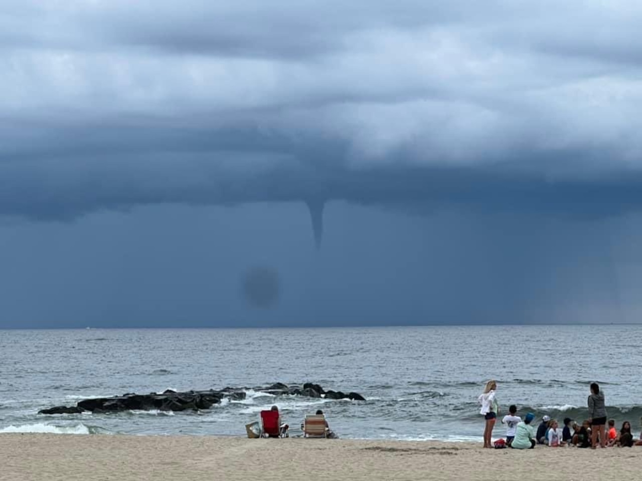 LensReality's tweet card. Video footage showed the waterspout spinning near Barnegat Inlet at about 10:38 a.m., and it may have been swirling for about 2 to 3 minutes, the weather service said.