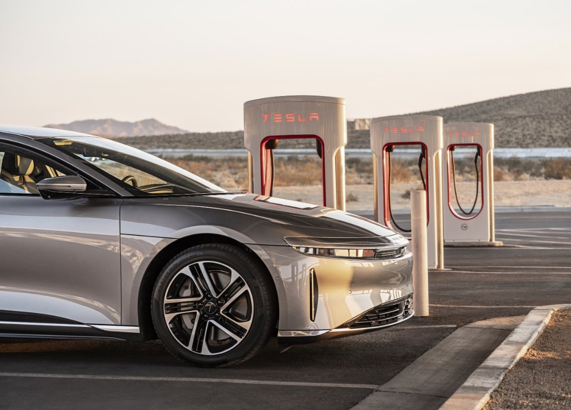 engadget's tweet card. Lucid EVs will soon have full access to Tesla's Supercharger network, with some caveats for the Air. That vehicle requires an adapter and is limited to a 50kW peak charge rate.