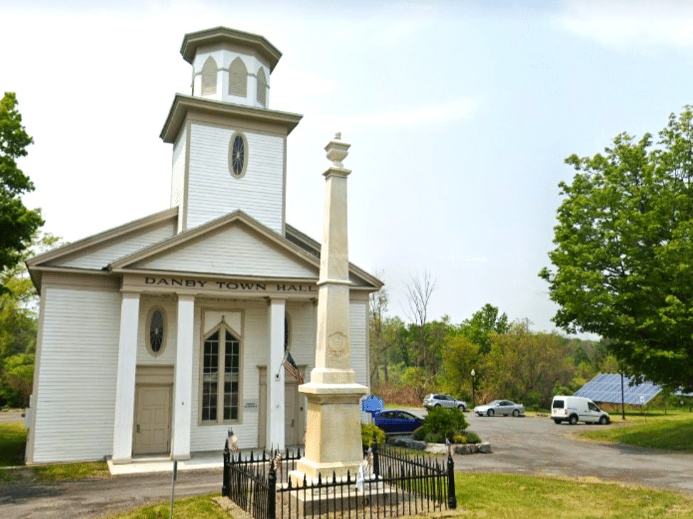 TompkinsWeekly's tweet card. Danby goes green with new heat pumps in its town hall. Discover how a $60,000 grant transforms the 1840s building.
