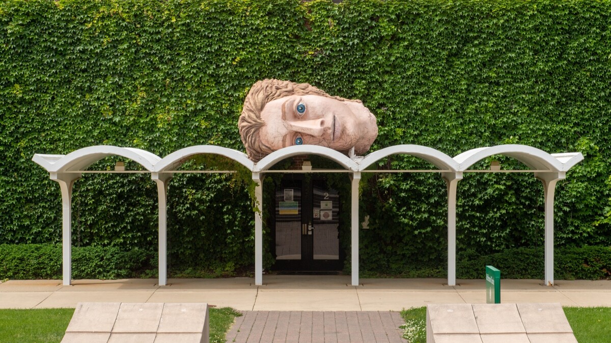 alicesmonkey's tweet card. It’s the end of an era for Illinois Wesleyan University’s School of Theatre Arts, which housed a bodiless Aphrodite head on top of their building for more than two decades.