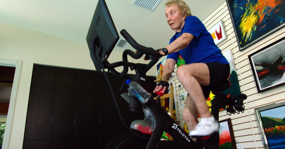 CBSMornings's tweet card. After more than 2,900 rides, 91-year-old Dottie Dorion convinced Peloton to create new age brackets for riders 90 and older.