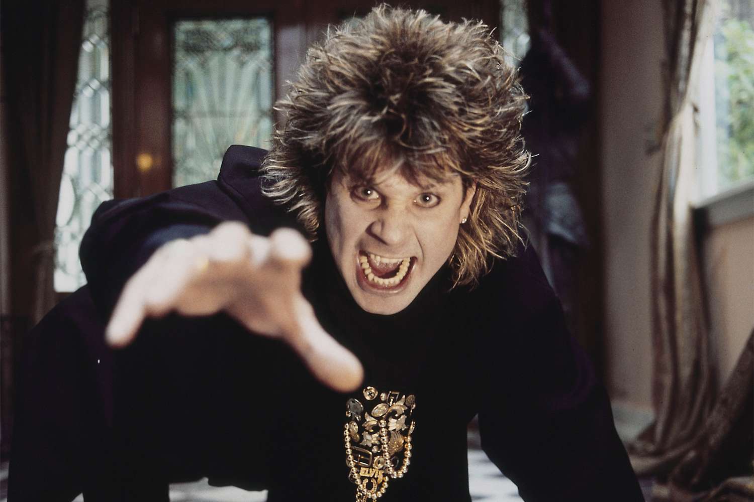 EW's tweet card. Ozzy Osbourne put a lot of things in his mouth — was a live bat really one of them?